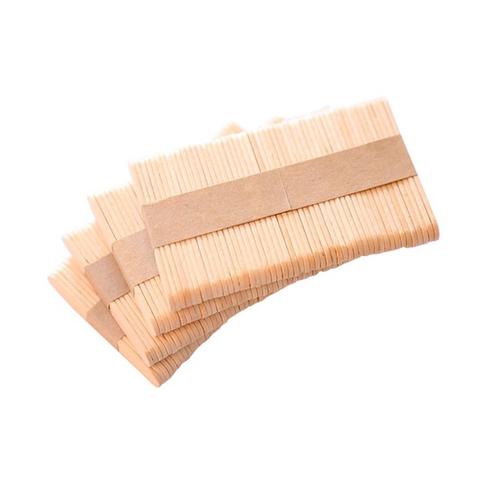 Wooden ice cream sticks and spoons